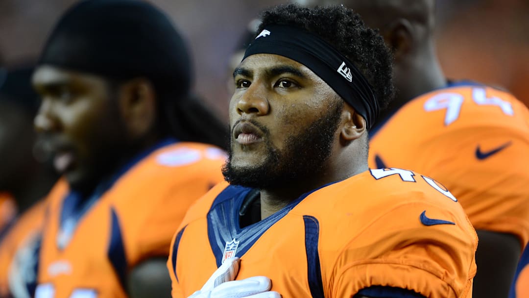 Oct 23, 2014; Denver, CO, USA; Denver Broncos strong safety T.J. Ward (43) during the national anthem before the game against the San Diego Chargers at Sports Authority Field at Mile High. 