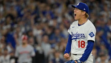 Oct 1, 2025; Los Angeles, California, USA; Los Angeles Dodgers starting pitcher Yoshinobu Yamamoto (18) celebrates after throwing against the Cincinnati Reds in the sixth inning during game two of the Wildcard round for the 2025 MLB playoffs at Dodger Stadium. Mandatory Credit: Jayne Kamin-Oncea-Imagn Images
