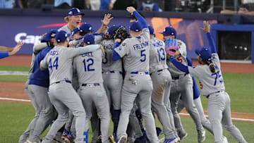 Nov 1, 2025; Toronto, Ontario, CAN; The Los Angeles Dodgers celebrate defeating the Toronto Blue Jays in game seven of the 2025 MLB World Series at Rogers Centre. Mandatory Credit: Kevin Sousa-Imagn Images