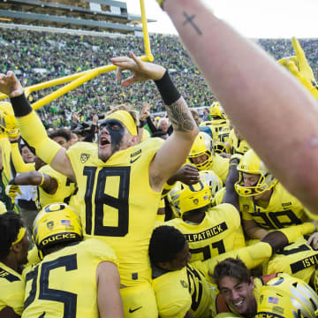 Oct 13, 2018; Eugene, OR, USA; The Oregon Ducks celebrate in the end zone after a game against Washington Huskies at Autzen Stadium. The Ducks won in overtime 30-27.