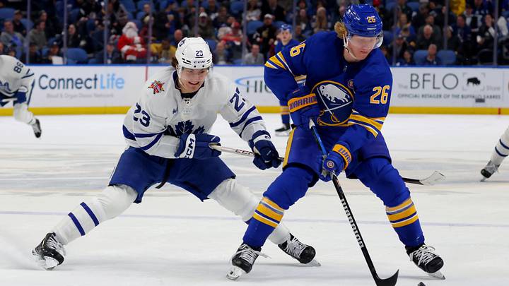 Buffalo Sabres defenseman Rasmus Dahlin (26) controls the puck: Timothy T. Ludwig-Imagn Images