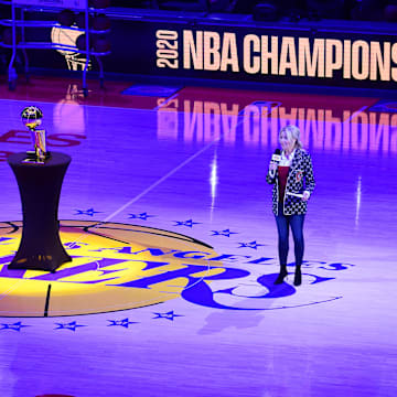 May 12, 2021; Los Angeles, California, USA; Los Angeles Lakers president Jeanie Buss speaks before the reveal of the 2020 champions banner at Staples Center. Mandatory Credit: Gary A. Vasquez-Imagn Images