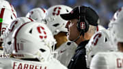 Nov 8, 2025; Chapel Hill, North Carolina, USA;  Stanford Cardinal head coach Frank Reich with his players in the third quarter at Kenan Stadium. Mandatory Credit: Bob Donnan-Imagn Images