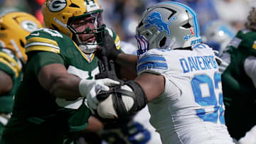 Green Bay Packers offensive tackle Zach Tom (50) blocks Detroit Lions defensive tackle Marcus Davenport (92) during the first quarter of their game Sunday, September 7, 2025 at Lambeau Field in Green Bay, Wisconsin.