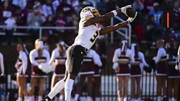 Nov 23, 2024; Starkville, Mississippi, USA; Missouri Tigers wide receiver Luther Burden III (3) attempts to make a reception against the Mississippi State Bulldogs during the first quarter at Davis Wade Stadium at Scott Field. Mandatory Credit: Matt Bush-Imagn Images