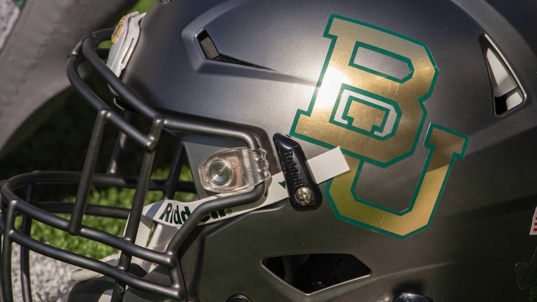 Oct 17, 2015; Waco, TX, USA; A detailed view of a Baylor Bears helmet before the game between the Bears and the West Virginia Mountaineers at McLane Stadium. The Bears defeat the Mountaineers 62-38. Oct 17, 2015; Waco, TX, USA; A detailed view of a Baylor Bears helmet before the game between the Bears and the West Virginia Mountaineers at McLane Stadium. The Bears defeat the Mountaineers 62-38.