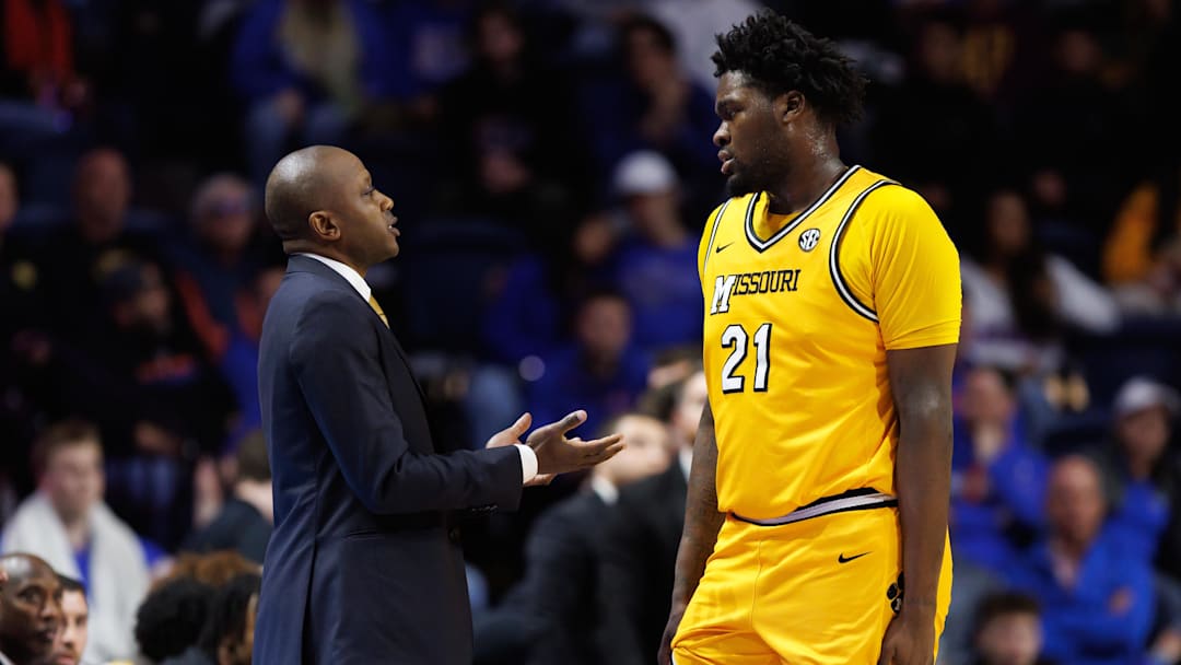 Missouri Tigers center Peyton Marshall (21) talks to his head coach Dennis Gates, in a game versus the Florida Gators last season.