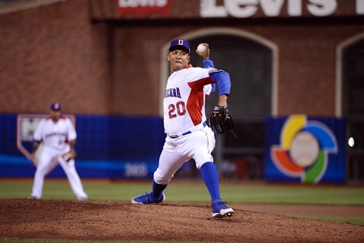 Dominican Republic pitcher Octavio Dotel throws against Puerto Rico in the World Baseball Classic Championship.