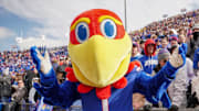 Oct 28, 2023; Lawrence, Kansas, USA; The Kansas Jayhawks mascot poses for a photo against the Oklahoma Sooners during the game at David Booth Kansas Memorial Stadium. Mandatory Credit: Denny Medley-Imagn Images