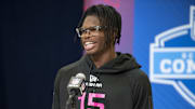 Travis Hunter speaks during the NFL combine.