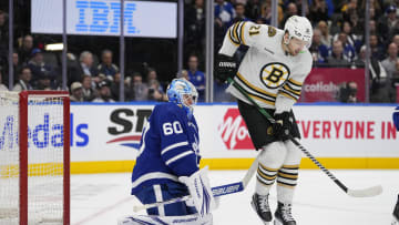 Mar 4, 2024; Toronto, Ontario, CAN; Boston Bruins forward James van Riemsdyk (21) gets out of the way of a shot on Toronto Maple Leafs goaltender Joseph Woll (60) during the second period at Scotiabank Arena. Mandatory Credit: John E. Sokolowski-USA TODAY Sports