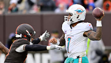Cleveland Browns safety Grant Delpit (9) rushes Miami Dolphins quarterback Tua Tagovailoa (1) during the second half at Huntington Bank Field.