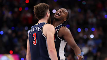 Nov 14, 2025; Inglewood, California, USA;  Arizona Wildcats guard Anthony Dell'Orso (3) celebrates with guard Jaden Bradley (0) during the second half of the Hall of Fame Series game against the UCLA Bruins at Intuit Dome. Mandatory Credit: Kiyoshi Mio-Imagn Images