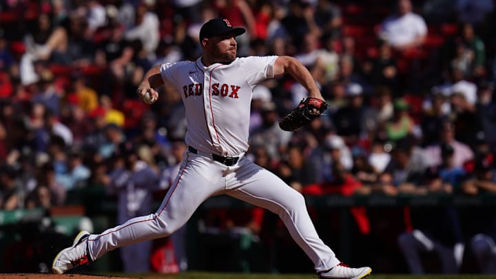 May 8, 2025; Boston, Massachusetts, USA; Boston Red Sox pitcher Liam Hendriks (31) throws a pitch against the Texas Rangers in the ninth inning at Fenway Park. Mandatory Credit: David Butler II-Imagn Images