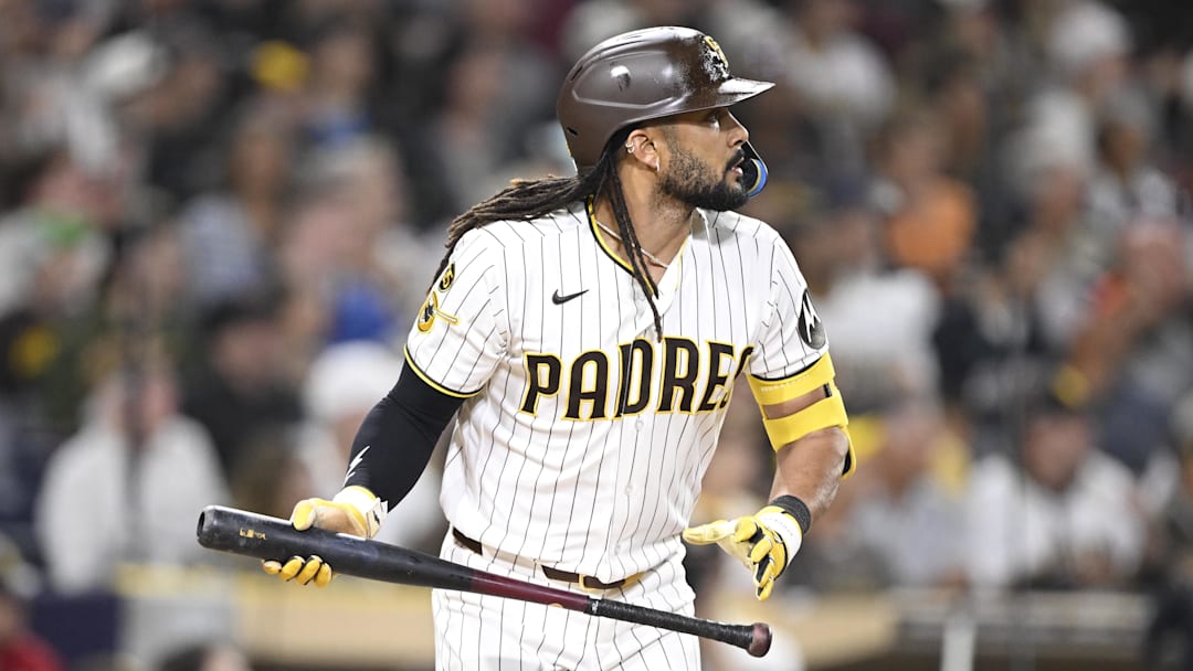 Apr 9, 2026; San Diego, California, USA; San Diego Padres right fielder Fernando Tatis Jr. (23) hits a sacrifice fly ball during the third inning against the Colorado Rockies at Petco Park. Mandatory Credit: Denis Poroy-Imagn Images Apr 9, 2026; San Diego, California, USA; San Diego Padres right fielder Fernando Tatis Jr. (23) hits a sacrifice fly ball during the third inning against the Colorado Rockies at Petco Park. Mandatory Credit: Denis Poroy-Imagn Images