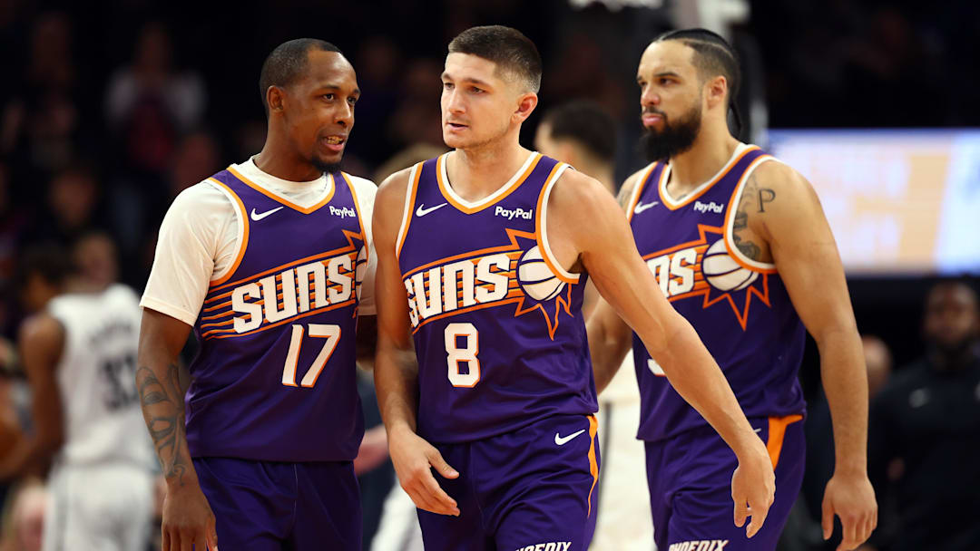Jan 27, 2026; Phoenix, Arizona, USA; Phoenix Suns guard Grayson Allen (8) with Jamaree Bouyea (17) and Dillon Brooks against the Brooklyn Nets in the second half at Mortgage Matchup Center. Mandatory Credit: Mark J. Rebilas-Imagn Images