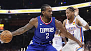 Feb 22, 2024; Oklahoma City, Oklahoma, USA; LA Clippers forward Kawhi Leonard (2) drives to the basket against Oklahoma City Thunder guard Aaron Wiggins (21) during the second half at Paycom Center. Mandatory Credit: Alonzo Adams-Imagn Imagesf