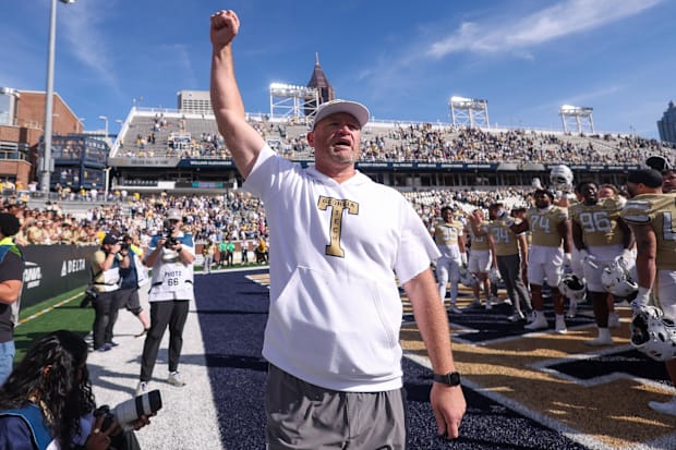 Georgia Tech coach Brent Key celebrates after a victory.