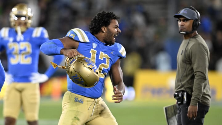 Nov 11, 2023; Pasadena, California, USA;  UCLA Bruins defensive lineman Grayson Murphy (12) reacts after receiving a personal foul playing against the Arizona State Sun Devils during the second half at the Rose Bowl. Mandatory Credit: Alex Gallardo-USA TODAY Sports