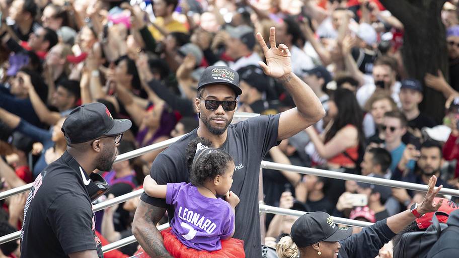 Toronto Raptors forward Kawhi Leonard salutes the crowd at the Toronto Raptors Championship Parade.