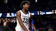Jan 25, 2025; Nashville, Tennessee, USA;  Vanderbilt Commodores forward Jaylen Carey (22) celebrates his slam dunk against the Kentucky Wildcats.during the first half at Memorial Gymnasium. Mandatory Credit: Steve Roberts-Imagn Images