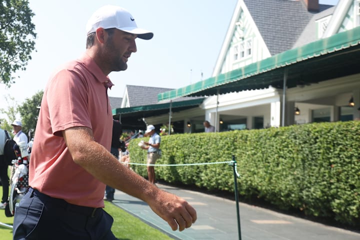 Scottie Scheffler leaves the putting green during a practice round for the U.S. Open golf tournament at Oakmont Country Club.