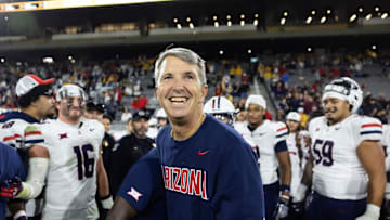 Nov 28, 2025; Tempe, Arizona, USA; Arizona Wildcats head coach Brent Brennan celebrates against the Arizona State Sun Devils during the 99th Territorial Cup at Mountain America Stadium. Mandatory Credit: Mark J. Rebilas-Imagn Images