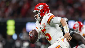Sep 22, 2024; Atlanta, Georgia, USA; Kansas City Chiefs quarterback Patrick Mahomes (15) scrambles against the Atlanta Falcons in the fourth quarter at Mercedes-Benz Stadium. Mandatory Credit: Brett Davis-Imagn Images