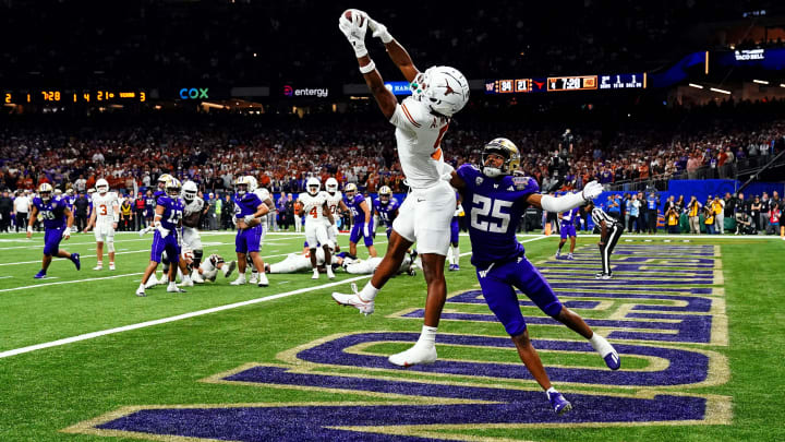 Jan 1, 2024; New Orleans, LA, USA; Texas Longhorns wide receiver Adonai Mitchell (5) catches a Jan 1, 2024; New Orleans, LA, USA; Texas Longhorns wide receiver Adonai Mitchell (5) catches a