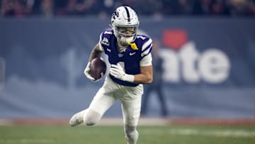 Dec 26, 2024; Phoenix, AZ, USA; Kansas State Wildcats wide receiver Jayce Brown (1) against the Rutgers Scarlet Knights during the Rate Bowl at Chase Field. Mandatory Credit: Mark J. Rebilas-Imagn Images