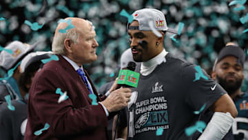 Feb 9, 2025; New Orleans, LA, USA; Fox sports presenter Terry Bradshaw (L) interviews Philadelphia Eagles quarterback Jalen Hurts (R) during the championship trophy presentation after the Eagles' game against the Kansas City Chiefs in Super Bowl LIX at Caesars Superdome. Mandatory Credit: Geoff Burke-Imagn Images