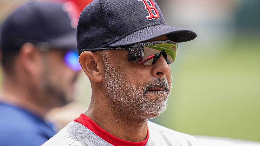 Jun 1, 2025; Cumberland, Georgia, USA; Boston Red Sox manager Alex Cora (13) shown in the dugout before the game against the Atlanta Braves at Truist Park. Mandatory Credit: Dale Zanine-Imagn Images