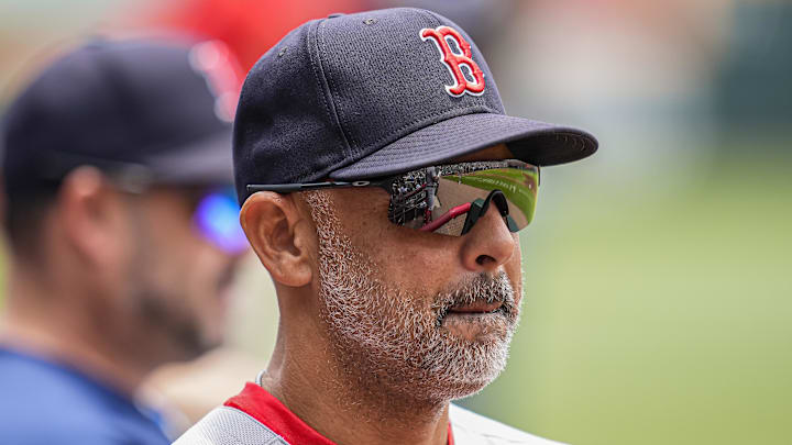 Jun 1, 2025; Cumberland, Georgia, USA; Boston Red Sox manager Alex Cora (13) shown in the dugout before the game against the Atlanta Braves at Truist Park. Mandatory Credit: Dale Zanine-Imagn Images