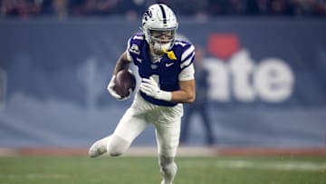 Dec 26, 2024; Phoenix, AZ, USA; Kansas State Wildcats wide receiver Jayce Brown (1) against the Rutgers Scarlet Knights during the Rate Bowl at Chase Field. Mandatory Credit: Mark J. Rebilas-Imagn Images