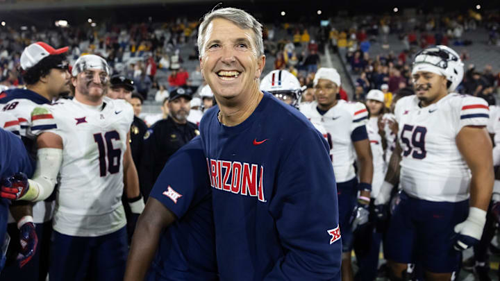 Nov 28, 2025; Tempe, Arizona, USA; Arizona Wildcats head coach Brent Brennan celebrates against the Arizona State Sun Devils during the 99th Territorial Cup at Mountain America Stadium. Mandatory Credit: Mark J. Rebilas-Imagn Images