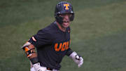 Tennessee infielder Andrew Fischer (11) celebrates hitting his second home run of the night during a NCAA baseball game between the Tennessee Volunteers and Vanderbilt Commodores at Lindsey Nelson Stadium on May 11, 2025. Vanderbilt won 7-5 against Tennessee.