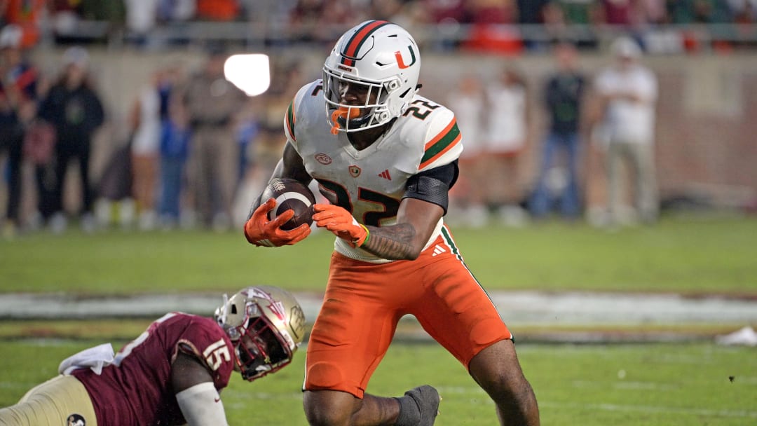 Nov 11, 2023; Tallahassee, Florida, USA; Miami Hurricanes running back Mark Fletcher Jr (22) runs the ball against the Florida State Seminoles during the second half at Doak S. Campbell Stadium. Mandatory Credit: Melina Myers-USA TODAY Sports