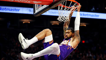 Mar 24, 2025; Phoenix, Arizona, USA; Phoenix Suns center Nick Richards (2) dunks the ball during the first quarter against the Milwaukee Bucks at Footprint Center. Mandatory Credit: Mark J. Rebilas-Imagn Images