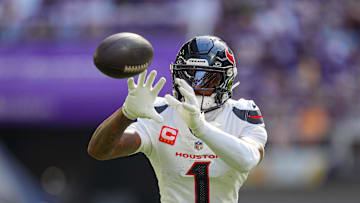 Sep 22, 2024; Minneapolis, Minnesota, USA; Houston Texans wide receiver Stefon Diggs (1) warms up before the game against the Minnesota Vikings at U.S. Bank Stadium. Mandatory Credit: Brad Rempel-Imagn Images