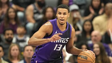 Apr 11, 2025; Sacramento, California, USA; Sacramento Kings forward Keegan Murray (13) dribbles against the Los Angeles Clippers during the first quarter at Golden 1 Center. Mandatory Credit: Darren Yamashita-Imagn Images