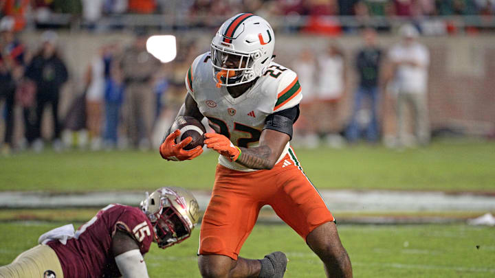 Nov 11, 2023; Tallahassee, Florida, USA; Miami Hurricanes running back Mark Fletcher Jr (22) runs the ball against the Florida State Seminoles during the second half at Doak S. Campbell Stadium. Mandatory Credit: Melina Myers-Imagn Images