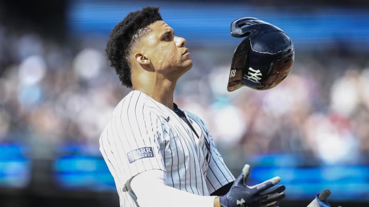 Sep 1, 2024; Bronx, New York, USA;  New York Yankees right fielder Juan Soto (22) tosses his helmet after flying out to end the sixth inning against the St. Louis Cardinals at Yankee Stadium. Mandatory Credit: Wendell Cruz-USA TODAY Sports