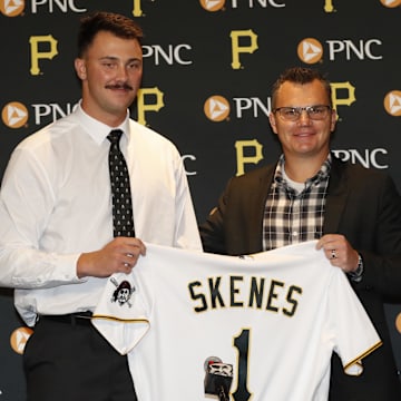 Jul 18, 2023; Pittsburgh, Pennsylvania, USA; Pittsburgh Pirates pitcher Paul Skenes (left) is introduced at a press conference by Pirates General Manager Ben Cherington (right) before the Pirates play the Cleveland Guardians at PNC Park. Skenes was the Pirates first round pick and the overall number one pick in the 2023 MLB first year player draft. Mandatory Credit: Charles LeClaire-Imagn Images