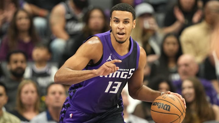 Apr 11, 2025; Sacramento, California, USA; Sacramento Kings forward Keegan Murray (13) dribbles against the Los Angeles Clippers during the first quarter at Golden 1 Center. Mandatory Credit: Darren Yamashita-Imagn Images