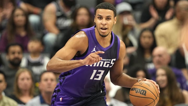 Apr 11, 2025; Sacramento, California, USA; Sacramento Kings forward Keegan Murray (13) dribbles against the Los Angeles Clippers during the first quarter at Golden 1 Center. Mandatory Credit: Darren Yamashita-Imagn Images