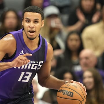 Apr 11, 2025; Sacramento, California, USA; Sacramento Kings forward Keegan Murray (13) dribbles against the Los Angeles Clippers during the first quarter at Golden 1 Center. Mandatory Credit: Darren Yamashita-Imagn Images