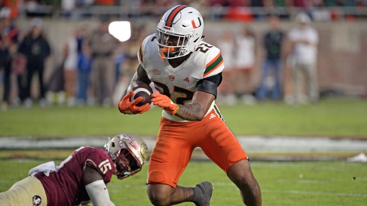 Nov 11, 2023; Tallahassee, Florida, USA; Miami Hurricanes running back Mark Fletcher Jr (22) runs the ball against the Florida State Seminoles during the second half at Doak S. Campbell Stadium. Mandatory Credit: Melina Myers-USA TODAY Sports