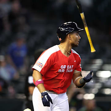 Great Britain catcher Harry Ford flips his bat after hitting a solo home run against Colombia in the World Baseball Classic in 2023 at Chase Field.