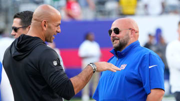 Aug 26, 2023; East Rutherford, New Jersey, USA; New York Jets head coach Robert Saleh (left) and New York Giants head coach Brian Daboll (right) talk before a game at MetLife Stadium.  Mandatory Credit: Robert Deutsch-USA TODAY Sports