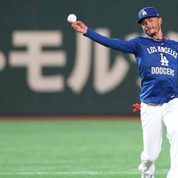 Los Angeles Dodgers shortstop Betts warms up before the game against the Yomiuri Giants at Tokyo Dome.